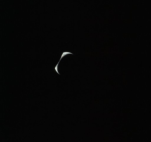 Cresent Earth eclipsed by silhouetted horizon of the moon