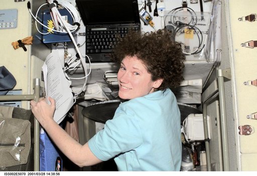 Helms in Service Module with computer