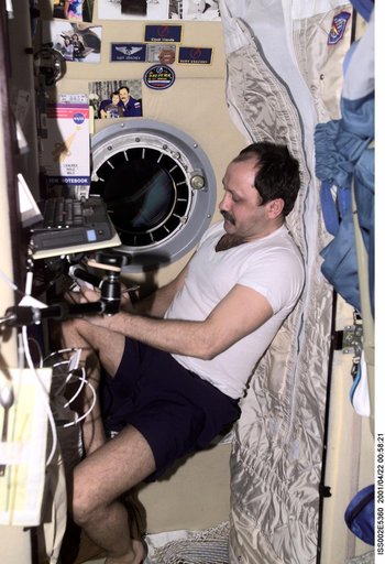 Usachev in sleep station in Service Module