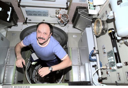 Usachev in hatch at aft end of Service module