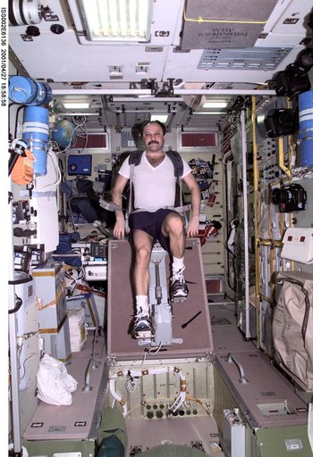 Usachev on cycle ergometer in Service Module
