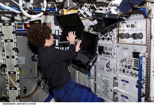 Helms with computers at HRF rack in Destiny module