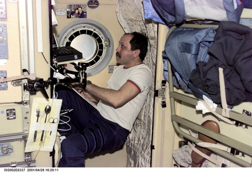 Usachev at sleep station in Service Module