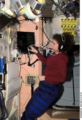 Helms talks to ground control from Node 1/Unity module