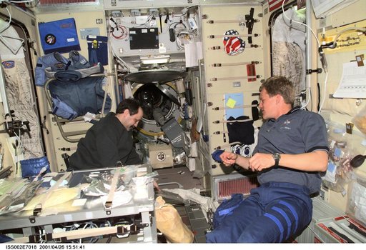 STS-100 MS Parazynski in conversation with Usachev in Service Module