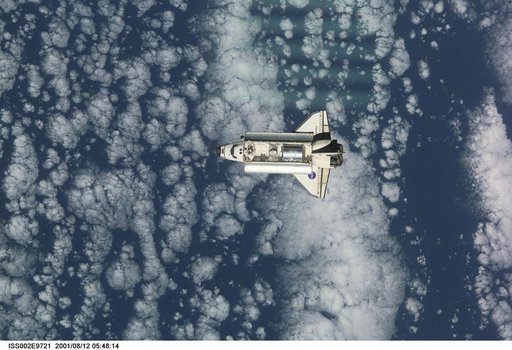 STS-105 orbiter Discovery on approach for docking with ISS