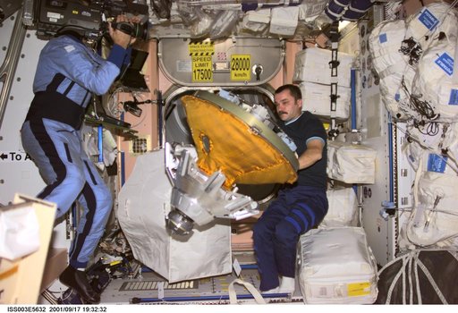 Tyurin packs the docking probe in Node 1 during Expedition Three