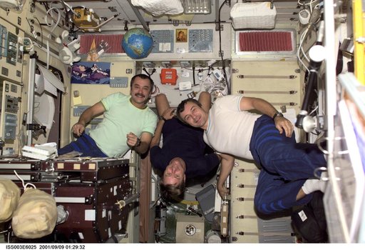 Culbertson, Tyurin and Dezhurov pose in Zvezda during Expedition Three
