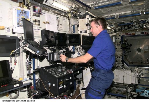 Culbertson works at the SSRMS controls in Destiny during Expedition Three's second EVA