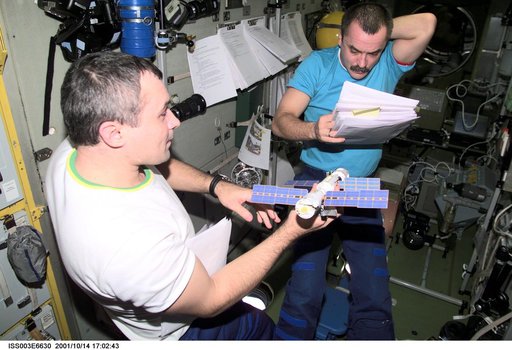 Dezhurov and Tyurin review procedures for the second EVA of Expedition Three
