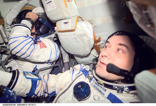 Dezhurov and Culbertson in the Soyuz spacecraft during Expedition Three