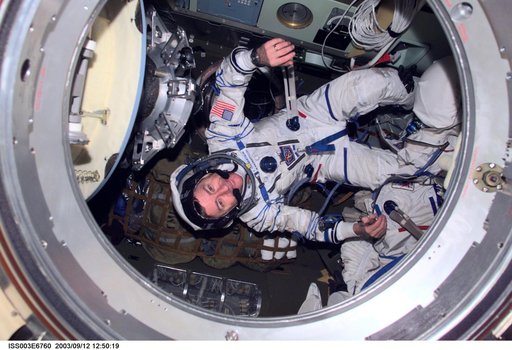 Culbertson poses in the Soyuz spacecraft during Expedition Three
