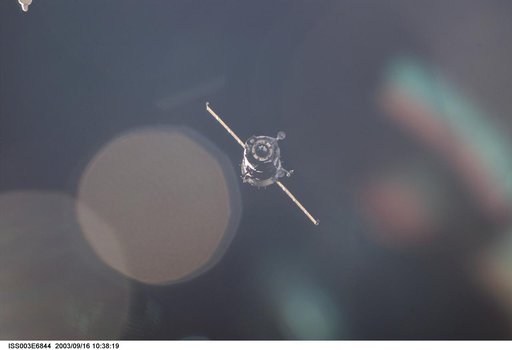 View of the approach of the Soyuz carrying the Taxi crew taken during Expedition Three