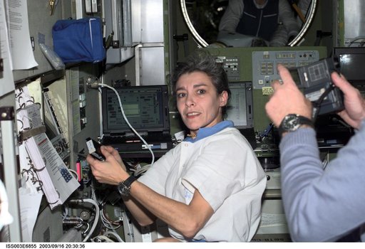 Haignere works in the Service Module during Expedition Three