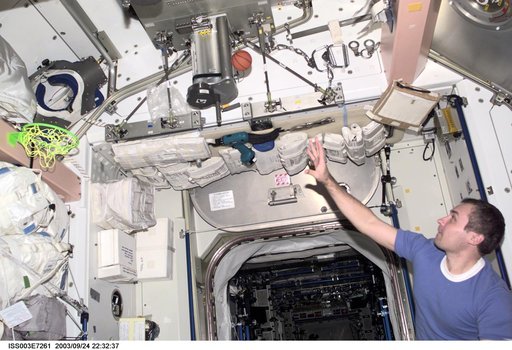 Dezhurov shoots a basketball in Node 1 during Expedition Three