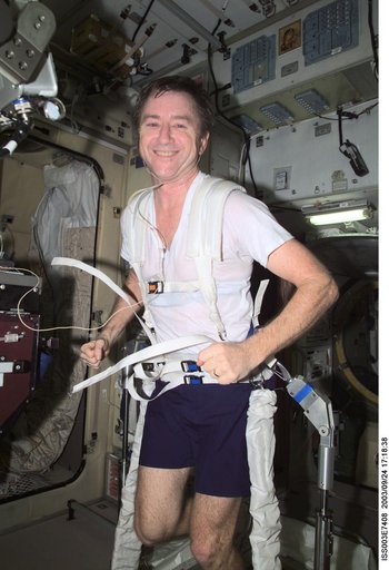 Culbertson exercises on TVIS in the Service Module during Expedition Three