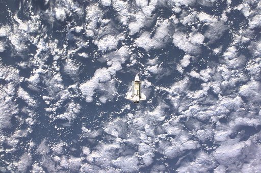View of the docking approach of Endeavour taken during Expedition Three