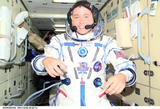 Bursch dons his Sokol suit in the FGB as Dezhurov looks on