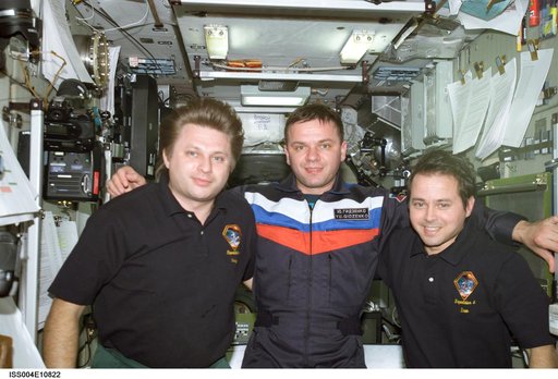 Onufrienko, Gidzenko, and Bursch group photo in Zvezda SM during Expedition Four