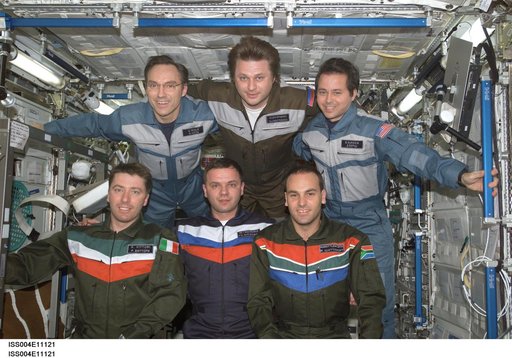 Soyuz 4 taxi-3 flight and Expedition Four crews pose for group photo in U.S. Lab