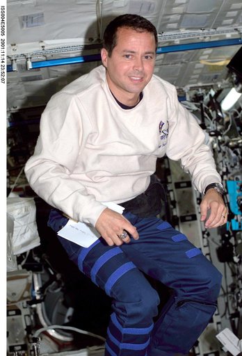 Dan Bursch smiles for the camera in the U.S. Laboratory during Expedition Four.