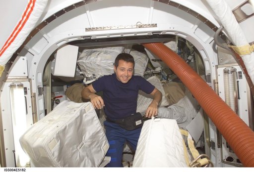 Bursch in the Quest Airlock during Expedition Four unpacking and stowage OPS