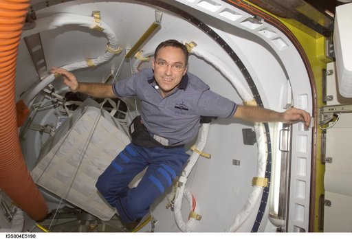 Walz in the Quest Airlock during Expedition Four unpacking and stowage OPS