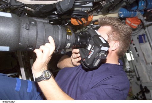 Onufrienko holds the Digital Camera System (DCS) in  Zvezda SM during Expedition Four