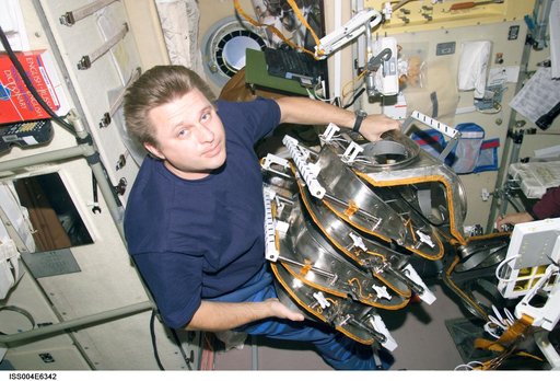 Onufrienko configures hardware in the SM for EVA 2,  Expedition Four