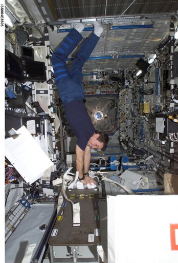 Bursch practices CPR in the U.S. Laboratory during Expedition Four