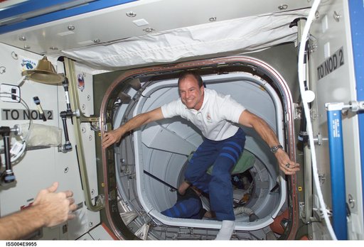 STS-110 Commander Bloomfield enters U.S. Lab from PMA 2 during Expedition Four