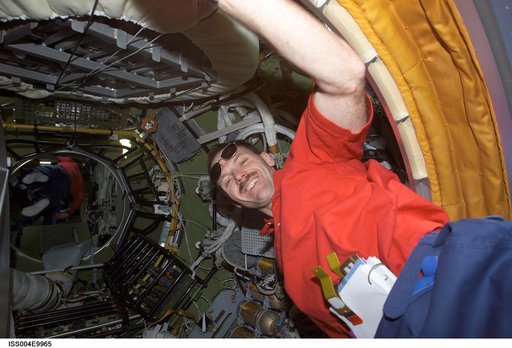 STS-110 MS Smith in Zvezda PA during Expedition Four on first day of joint OPS