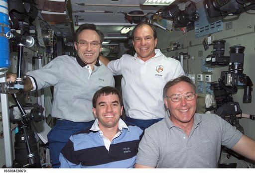 STS-110 and Expedition Four crewmembers in the Zvezda SM on first day of joint OPS