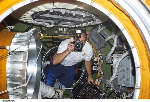 STS-110 CDR Bloomfield in Zvezda PA during Expedition Four on first day of joint OPS