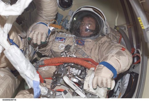 Portrait view of Whitson in Orlan suit