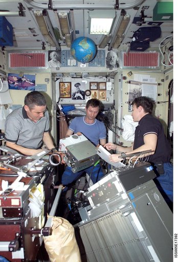 Expedition Five crew perform maintenance on the TVIS
