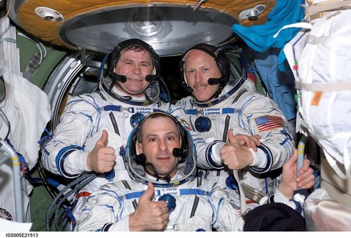 Expedition Six crewmembers pose in the FGB during Expedition Five on the ISS