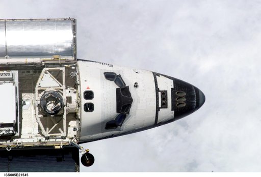 Space Shuttle Endeavour as it approaches the ISS during STS-113 mission