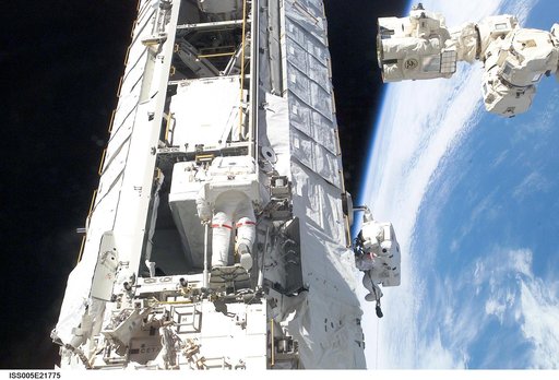 Lopez-Alegria and Herrington work on P1 truss on the ISS during EVA