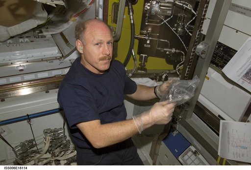 Bowersox handles part of the 02 / N2 system in the Airlock during Expedition Six
