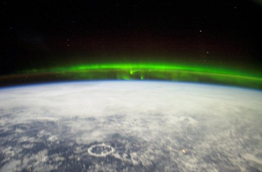 Crew Earth Observations (CEO) of the Aurora Borealis and city lights taken during Expedition Six