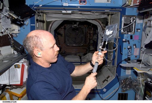 Bowersox works with the WMK in Destiny during Expedition Six