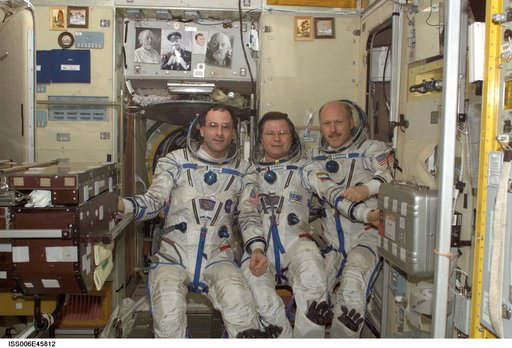 Informal portrait of Pettit, Budarin, and Bowersox in the SM during Expedition Six