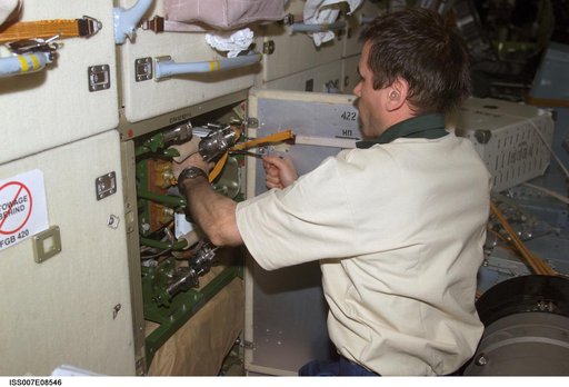 Expedition Seven CDR Malenchenko during maintenance task in the FGB