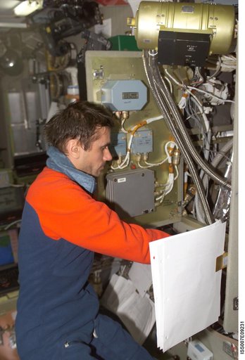 Expedition Seven CDR Malenkenko performs IFM on Condensate Water Processor