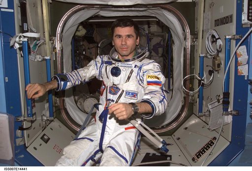 Expedition Seven Malenchenko wearing Sokol pressure suit in Destiny laboratory