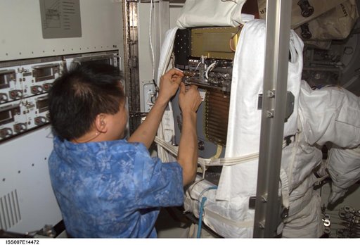 Expedition Seven Lu with EMU in Quest airlock