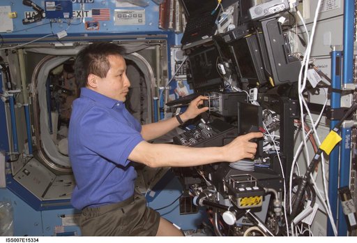 Expedition Seven Lu performs scheduled proficiency operation with the SSRMS