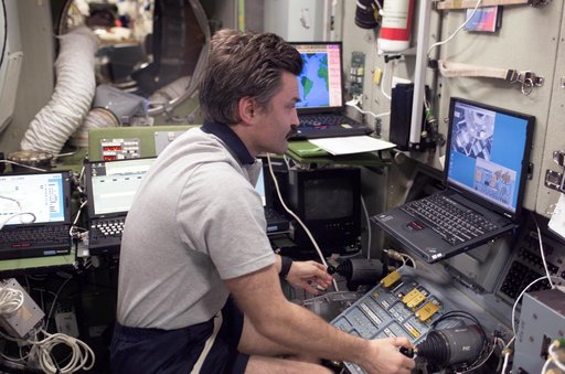 Kaleri works with the TORU teleoperated control system in the SM during Expedition 8