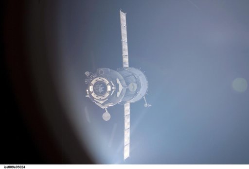 Soyuz TMA-3 separates from the Space Station after undocking, taking the Expedition 8 crew back to Earth